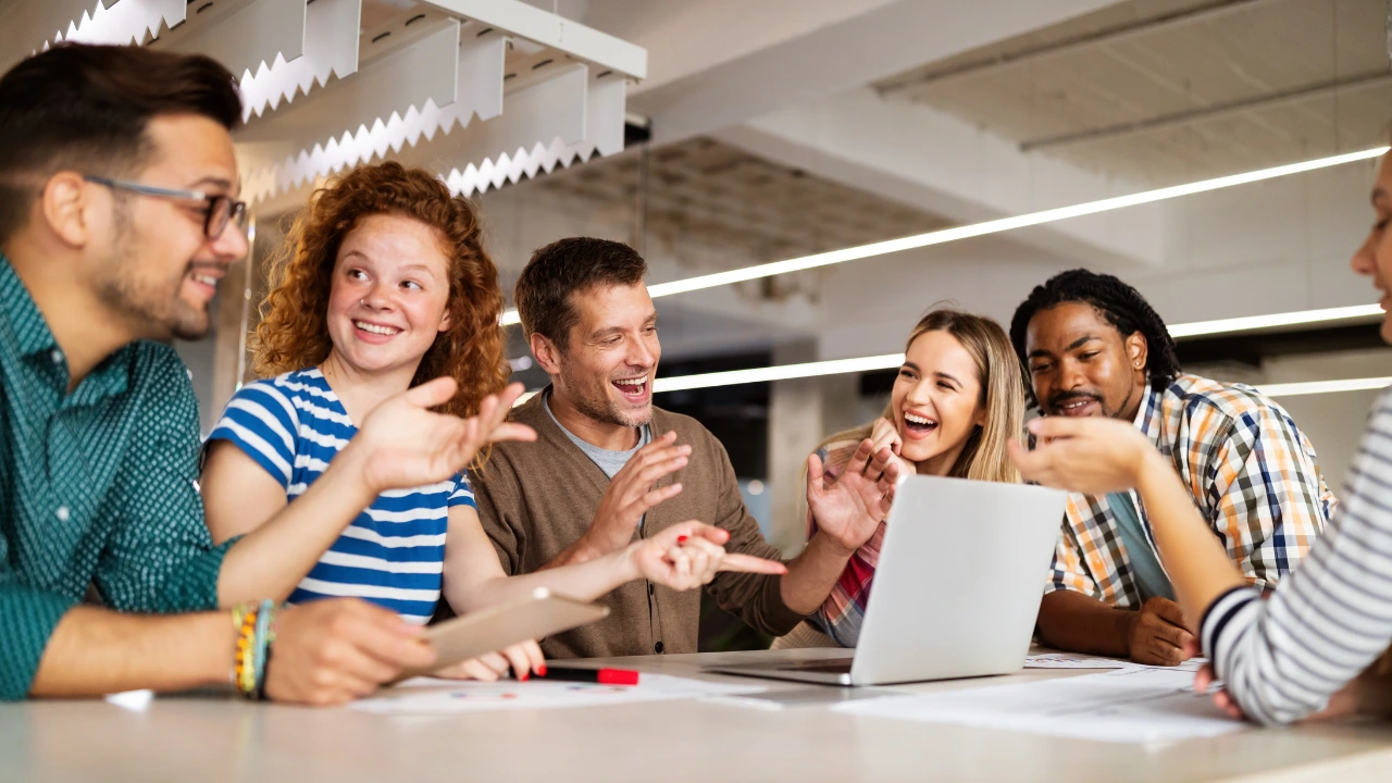 Happy employees during onboarding session, connecting and learning workplace culture